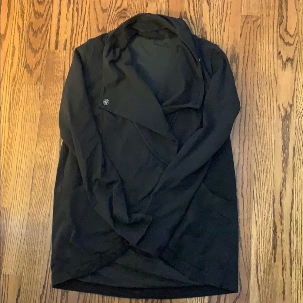Lululemon black jacket. Mid weight. Very cozy.